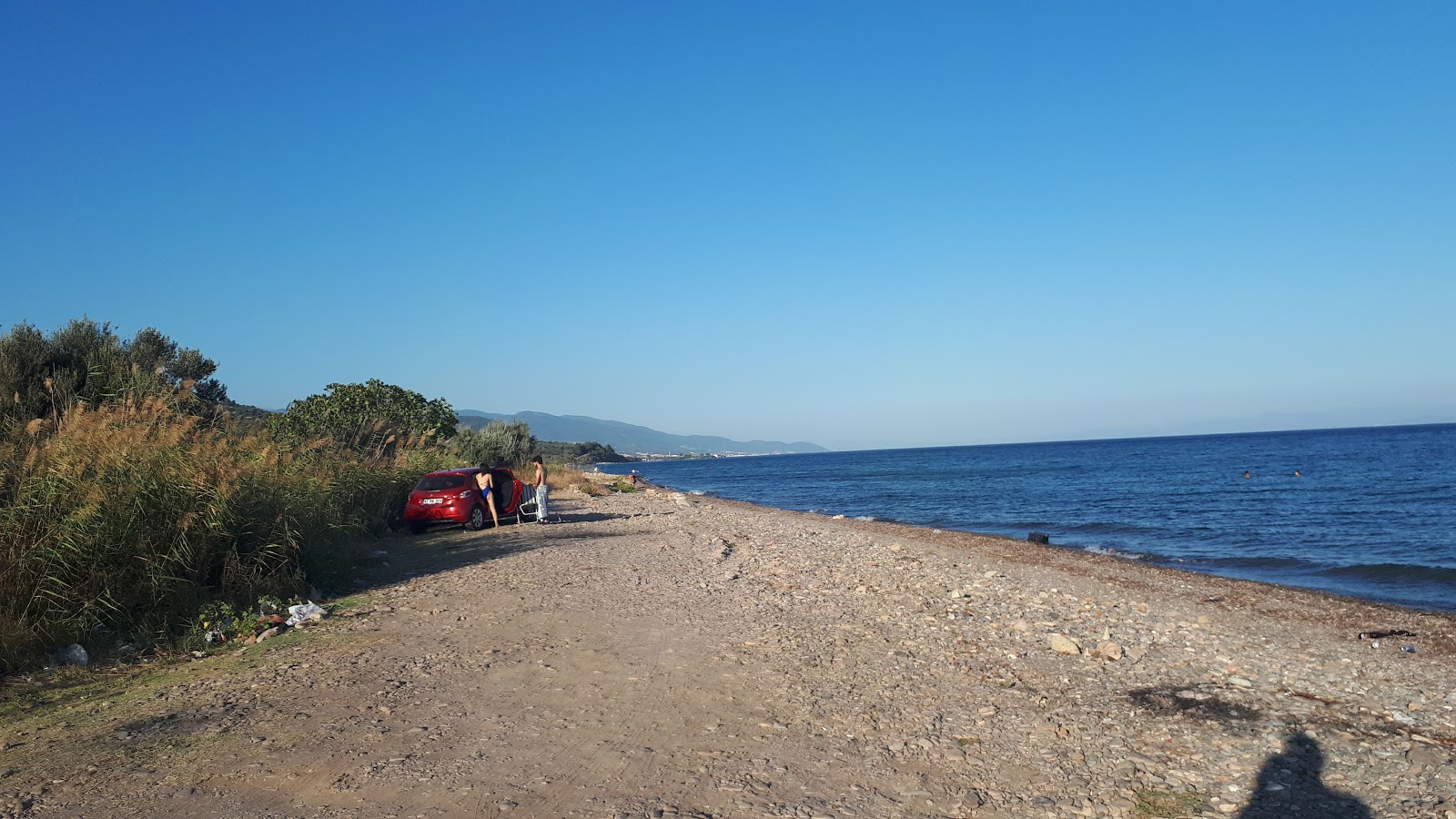 Foto de Assos Free beach con guijarro ligero superficie