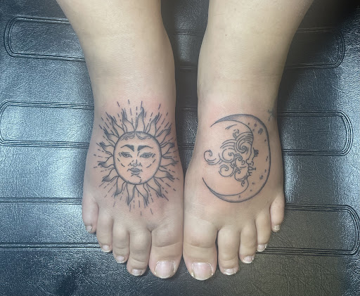 Explore baby foot print tattoo ideas, creative tattoo ideas in Largo, available at Ink Godz Tattoo 2
