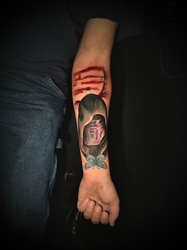 Find camping tattoo ideas for your next unique tattoo in Bucoda at Sunset State Tattoo