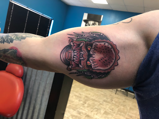 Explore small ear tattoo ideas, creative tattoo ideas in Leesville, available at Integrity Tattoo