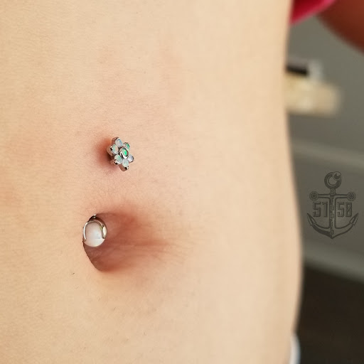 Explore small symbol tattoo ideas, creative tattoo ideas in Kearney, available at Studio 5150 Piercing & Fine Jewelry