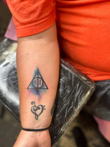 Explore hunting sleeve tattoo ideas, creative tattoo ideas in New Carlisle, available at Reckless Temptations