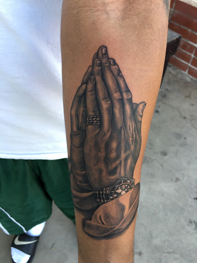 Explore cool arm tattoo ideas for guys, creative tattoo ideas in Beaumont, available at Roots Tattoo Studio