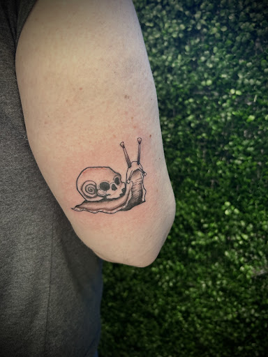 Explore easy hand tattoo ideas, creative tattoo ideas in Oviedo, available at Fine Ink Studios Tattoos