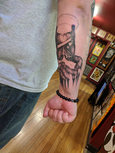 Explore sign language tattoo ideas, creative tattoo ideas in Corpus Christi, available at Pinnacle Tattoo