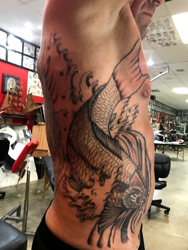 Tattoo Shop «Hellcat Tattoo», reviews and photos, 1896 Palm Beach Lakes Blvd #100, West Palm Beach, FL 33409, USA