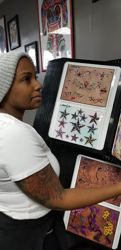 Tattoo Shop «Red Octopus Tattoos & Body Piercings», reviews and photos, 7465 Annapolis Rd, Hyattsville, MD 20784, USA