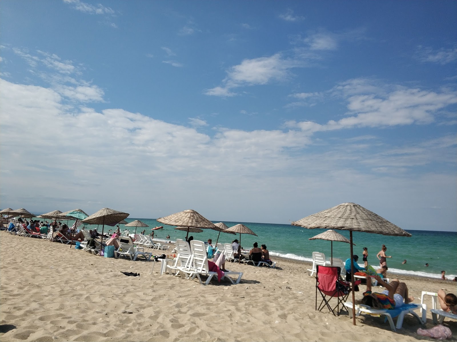 Fotografija Yalikoy beach in naselje