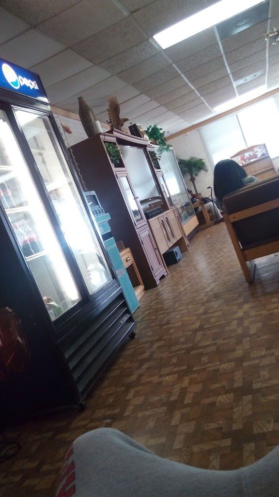 Miller's Barber & Style Shop 39705