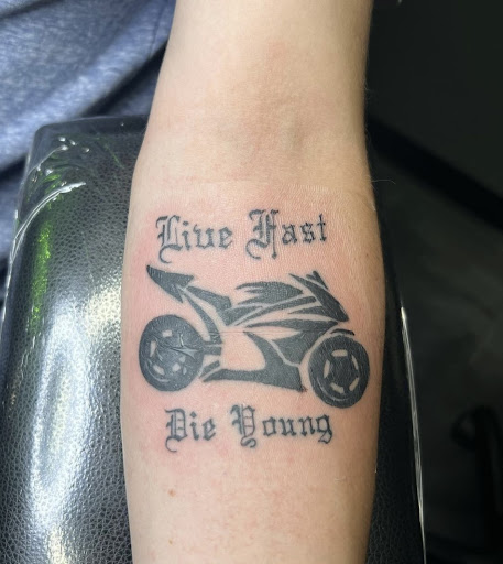 Explore red and black tattoo ideas, creative tattoo ideas in Peoria, available at Modern Ink Tattoo