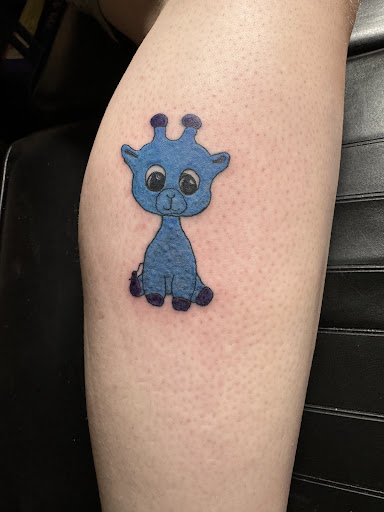 Explore curly hair tattoo ideas, creative tattoo ideas in Olympia, available at Bigfoot Tattoo & Piercing