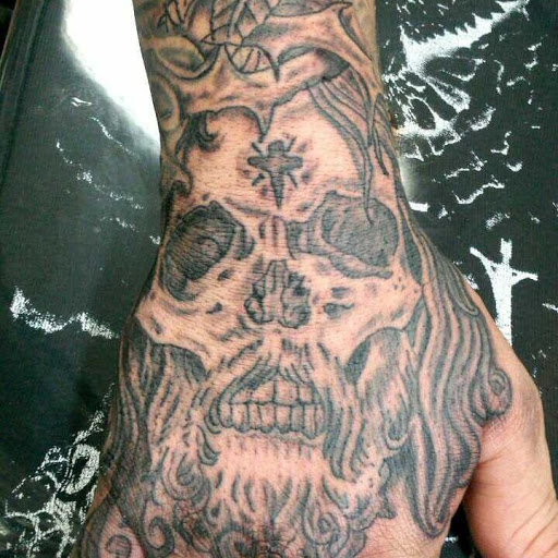 Find between the boob tattoo ideas for your next unique tattoo in Tucson at Tattoo Azteca Inc