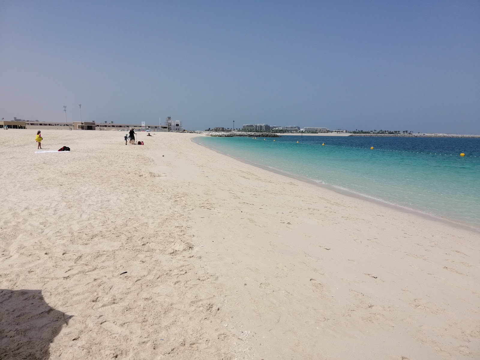 Foto van Mercato beach met helder fijn zand oppervlakte