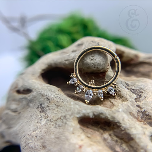 Explore c section scar tattoo ideas, creative tattoo ideas in Worcester, available at Elegance Piercing & Tattoo Inc.