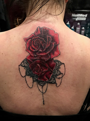 Explore small flower tattoo ideas, creative tattoo ideas in Patchogue, available at Long Island Ink tattoo