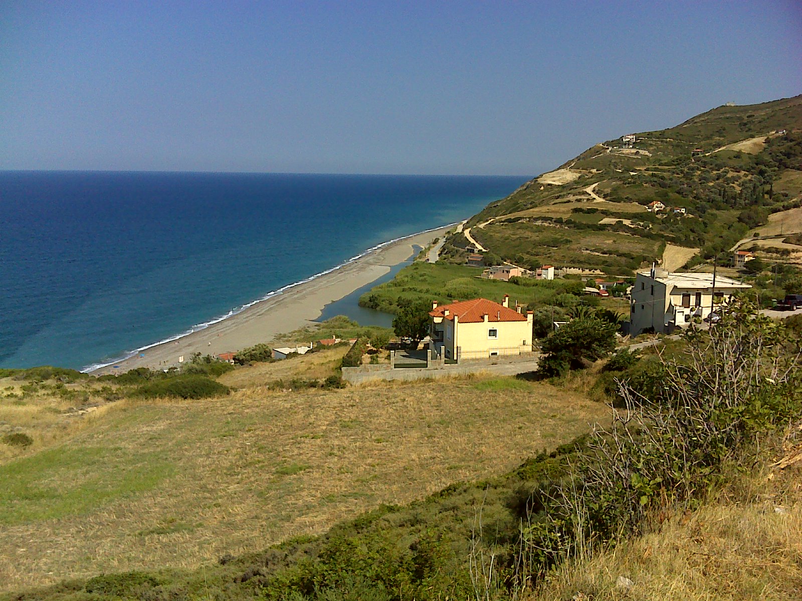 Fotografija Stomi beach podprto z obalami