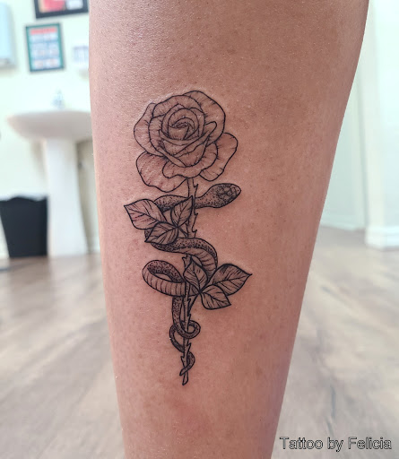 Explore tattooed wedding ring ideas, creative tattoo ideas in Fort Myers, available at Tiger Lotus Tattoo and Piercing