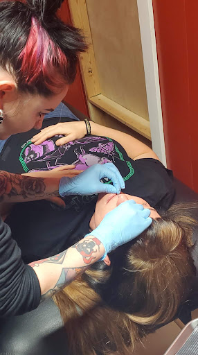 Explore mickey and minnie tattoo ideas, creative tattoo ideas in North Bend, available at Harleys Piercing Parlor