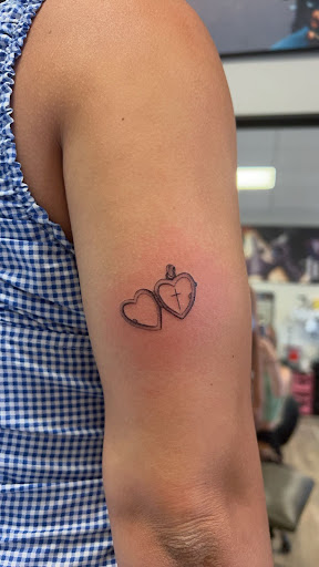 Find small tattoo ideas for mothers for your next unique tattoo in Oviedo at Fine Ink Studios Tattoos