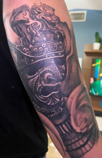 Explore urban tattoo ideas for men, creative tattoo ideas in Largo, available at Alchemy Tattoos and Body Piercings