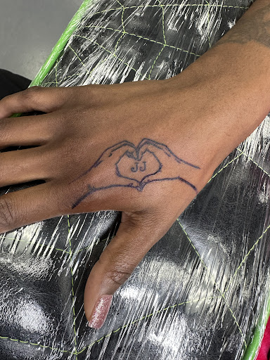 Find middle boob tattoo ideas for your next unique tattoo in Meridian at Creative Pain Tattoo Studio