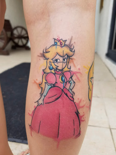 Explore cute female tattoo ideas, creative tattoo ideas in Deerfield Beach, available at Black Rose Tattoo Studio