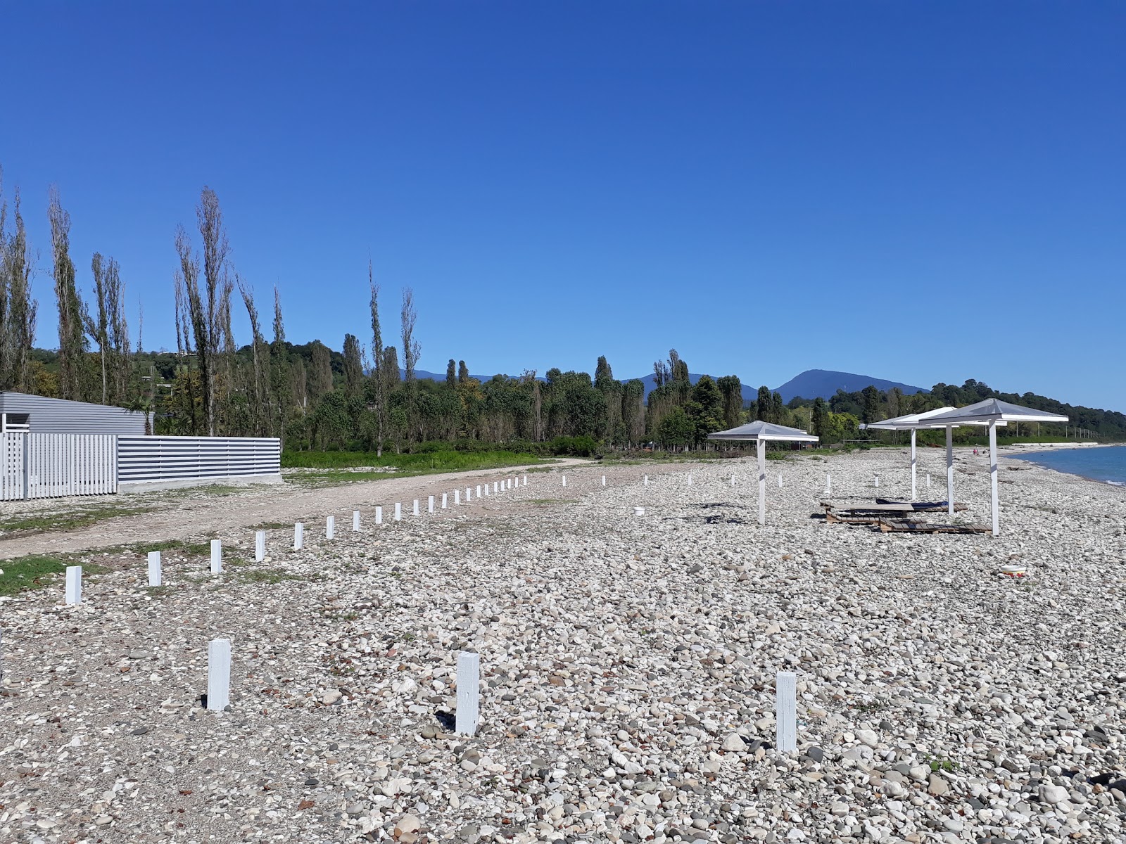 Fotografija Primorskoe beach z turkizna voda površino