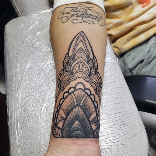 Find biohazard tattoo ideas for your next unique tattoo in Pearland at Black List Tattoo & Piercing Co.