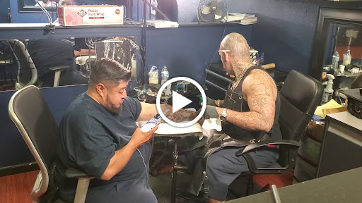 Explore tattoo flag ideas, creative tattoo ideas in Orange, available at Lincoln Avenue Tattoo