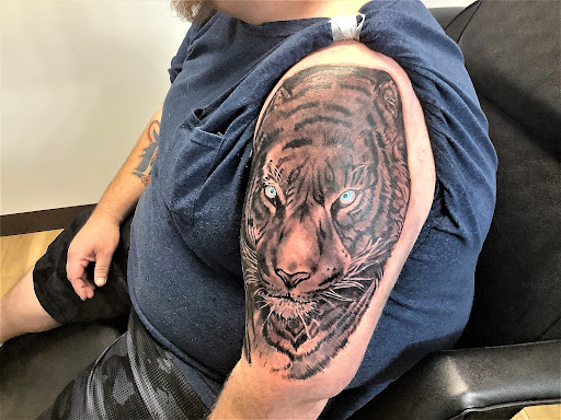 Explore minecraft tattoo ideas, creative tattoo ideas in Whitehall, available at Beachside Tattoos & Smoke Shop