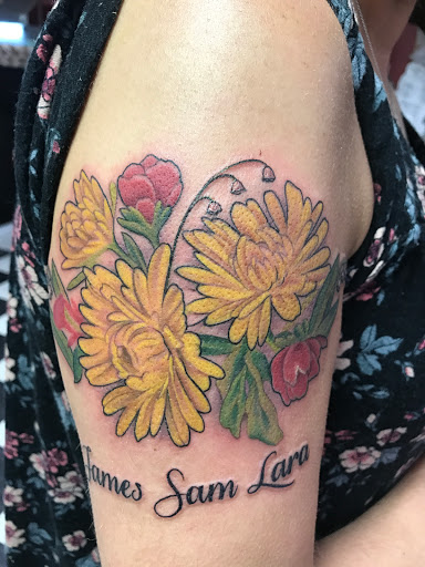 Explore chest tattoo lettering ideas, creative tattoo ideas in Albany, available at Make Your Mark Tattoo