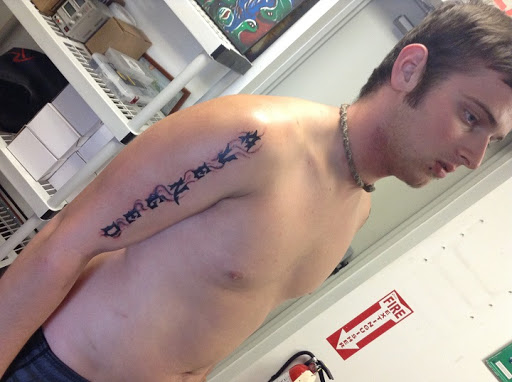 Explore tattoo ideas initials, creative tattoo ideas in Seymour, available at American Gypsy Tattoo Corp.