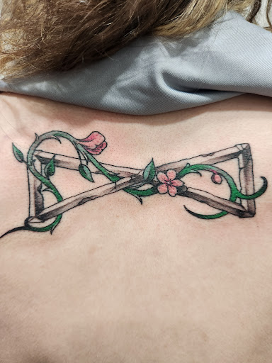 Explore pink tattoo ideas, creative tattoo ideas in Addison, available at Cat Tattoo