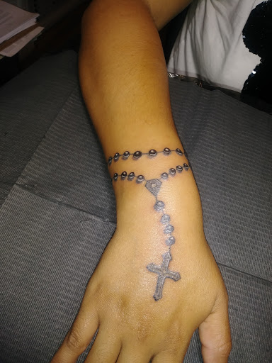 Explore cool neck tattoo ideas, creative tattoo ideas in Bronx, available at Tattoo Society Studio