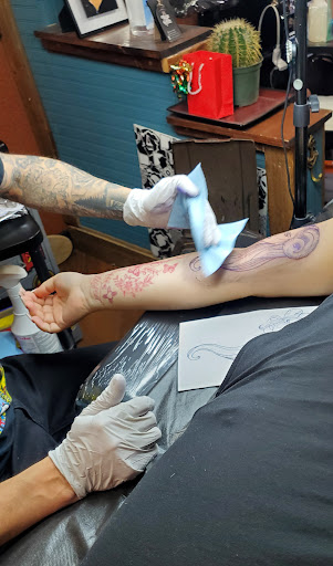 Find tattoo wedding band ideas for your next unique tattoo in Albuquerque at Iron Anchor Tattoo Parlour