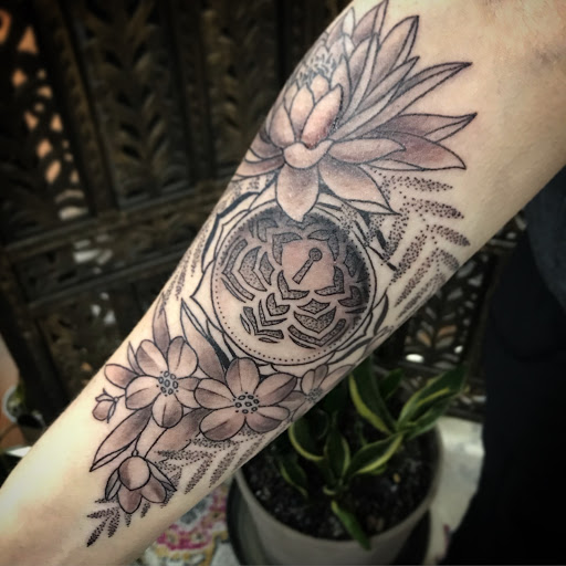 Explore black and white tattoo ideas for men, creative tattoo ideas in Tecumseh, available at Lucid Tattoo Gallery