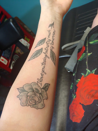 Tattoo Shop «Lovely Monkey Tattoo», reviews and photos, 9541 Main St, Whitmore Lake, MI 48189, USA