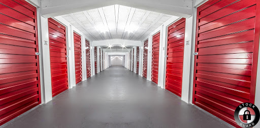 Logo da empresa - StockGuard - Guarda Móveis & Self Storage - Florianópolis