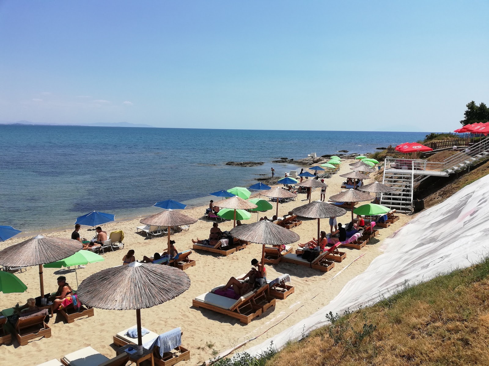 Foto von Paralia Porto Molo mit beiger sand Oberfläche