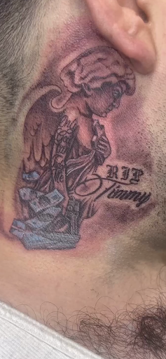 Find cardinal tattoo ideas for ladies for your next unique tattoo in Calumet City at Skinkraft Ink