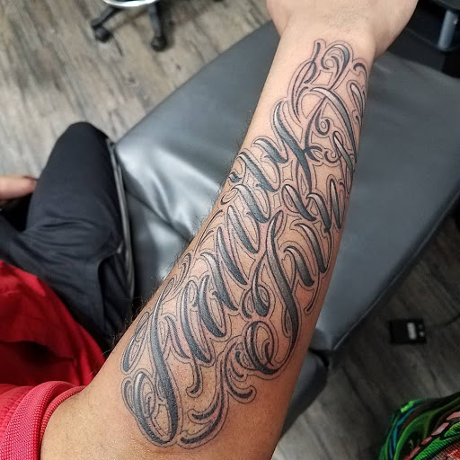 Explore cycle tattoo ideas, creative tattoo ideas in Atlanta, available at Black Cloud Tattoo and Piercing