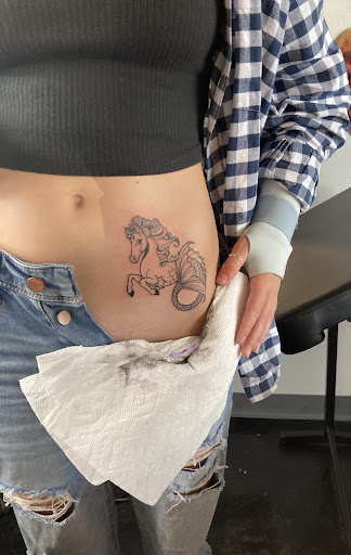 Explore evil dead tattoo ideas, creative tattoo ideas in Kissimmee, available at Fallen Heroes Tattoo & Piercing (Florida)