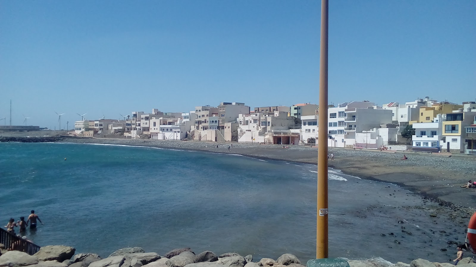 Photo de Playa de Pozo Izquierdo avec petite baie