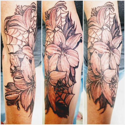 Explore hellscape battle sleeve tattoo ideas, creative tattoo ideas in Homosassa, available at Citrus Tattoos