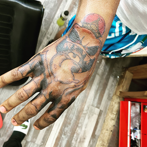 Explore spine tattoo ideas for men, creative tattoo ideas in Memphis, available at Inkatsuki Tattoos Art Studio