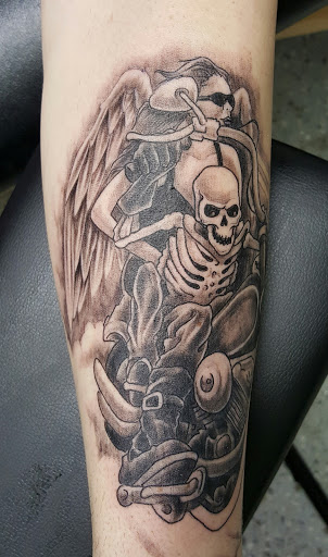 Explore dragon forearm tattoo ideas, creative tattoo ideas in Wichita, available at Body Canvas Tattooing