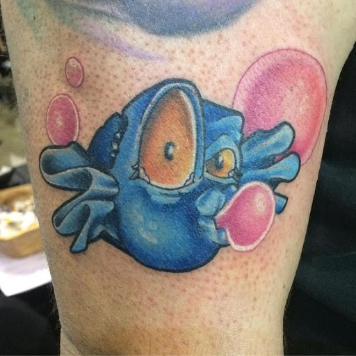 Find gizmo tattoo ideas for your next unique tattoo in Chapel Hill at Golden Falcon Tattoo and Piercing