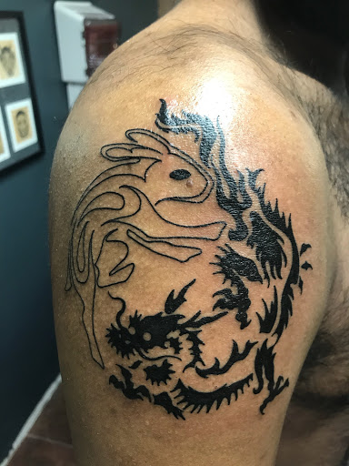 Explore mens small tattoo ideas, creative tattoo ideas in Olney, available at RAW INK Studio