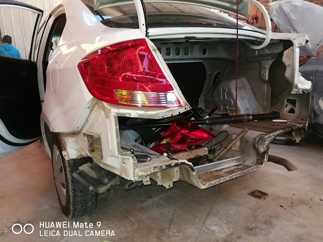 Servicio De Reparacion Y Mantenimiento Automotriz Fanerautos Limitada - Taller de reparación de automóviles
