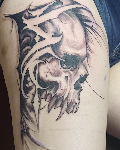 Explore peck tattoo ideas, creative tattoo ideas in Rapid City, available at Convicted Designs Tattoo & Piercing